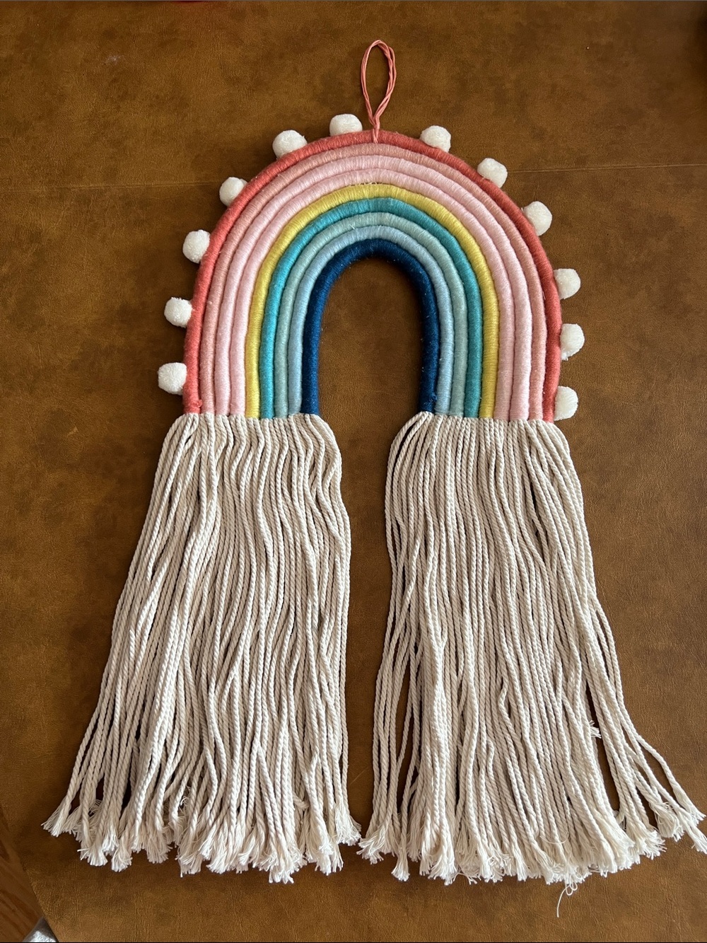 Handcrafted Rainbow Wall Hanging in Pink, Blue, Green, Yellow.